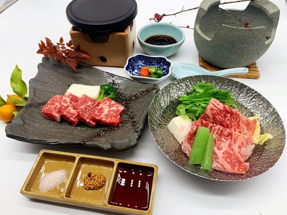 Отель Okumizuma Onsen Kaizuka Экстерьер фото