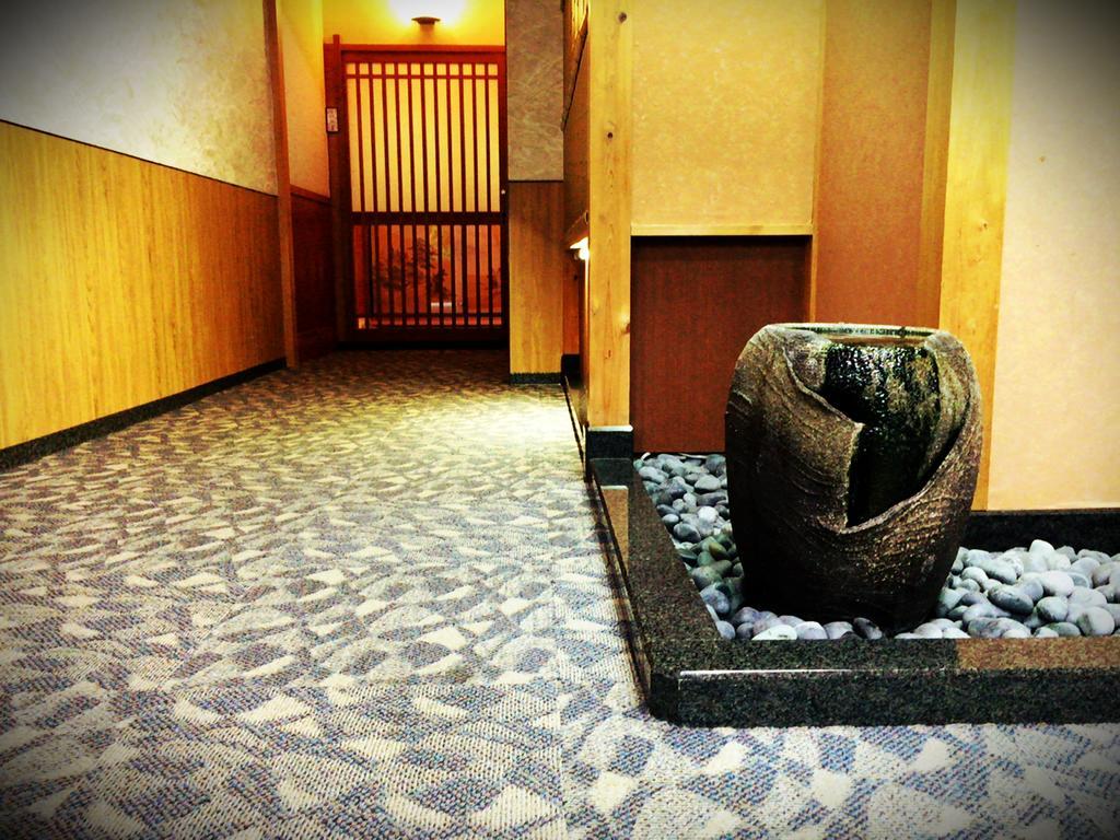 Отель Okumizuma Onsen Kaizuka Экстерьер фото