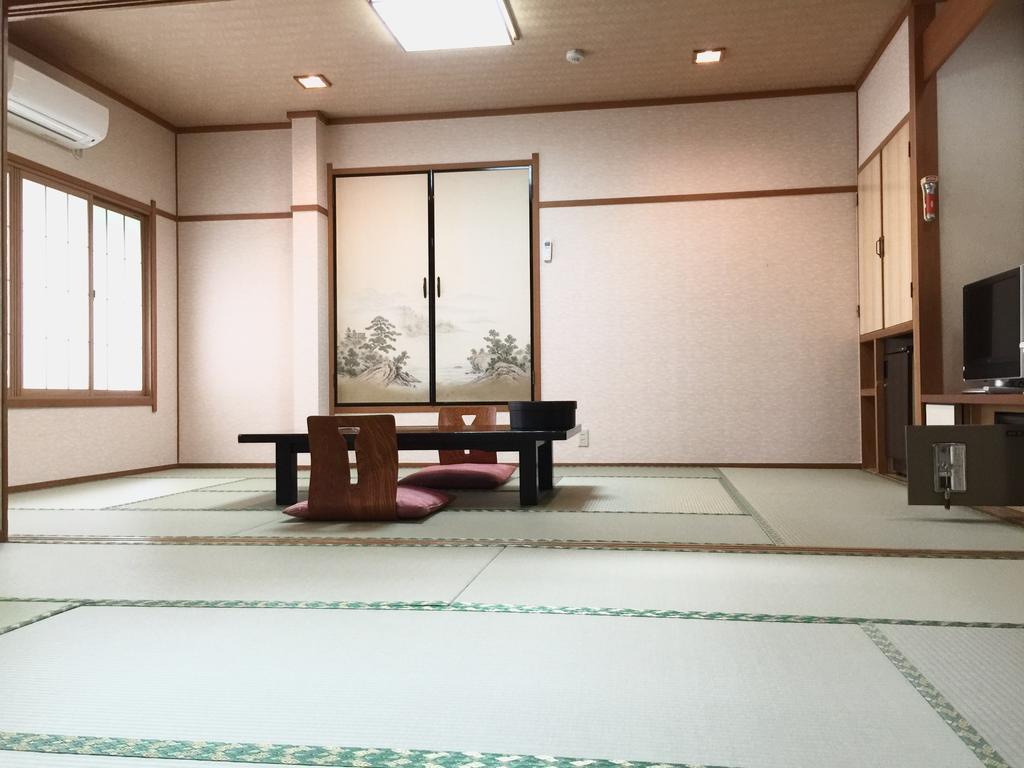 Отель Okumizuma Onsen Kaizuka Экстерьер фото