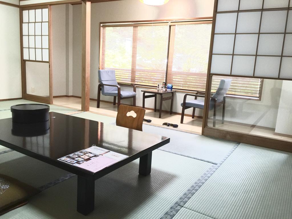 Отель Okumizuma Onsen Kaizuka Экстерьер фото