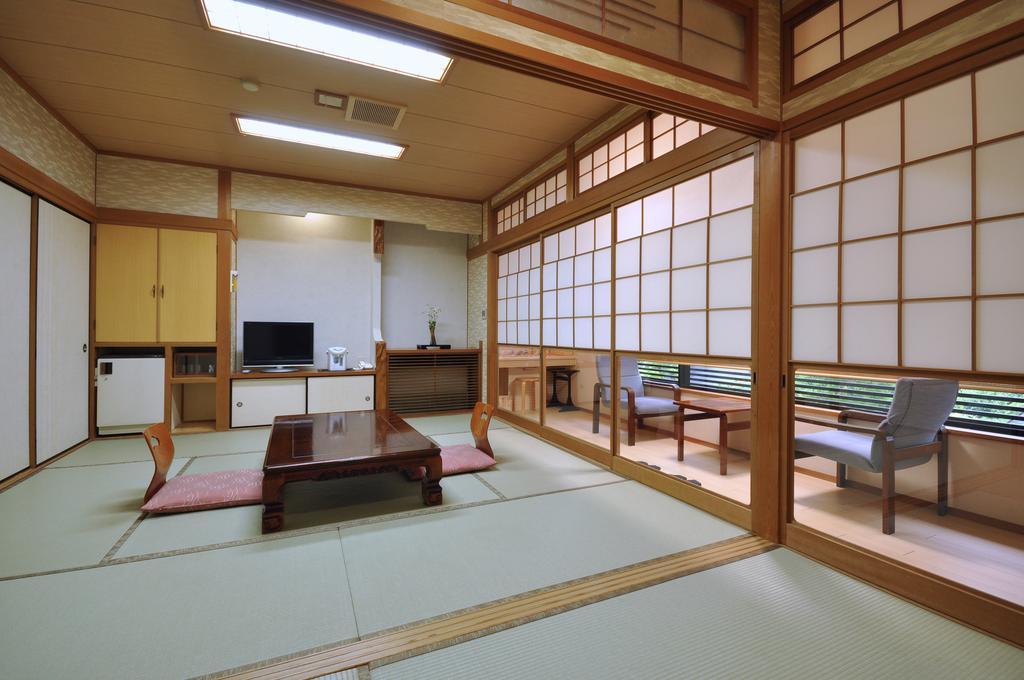 Отель Okumizuma Onsen Kaizuka Экстерьер фото