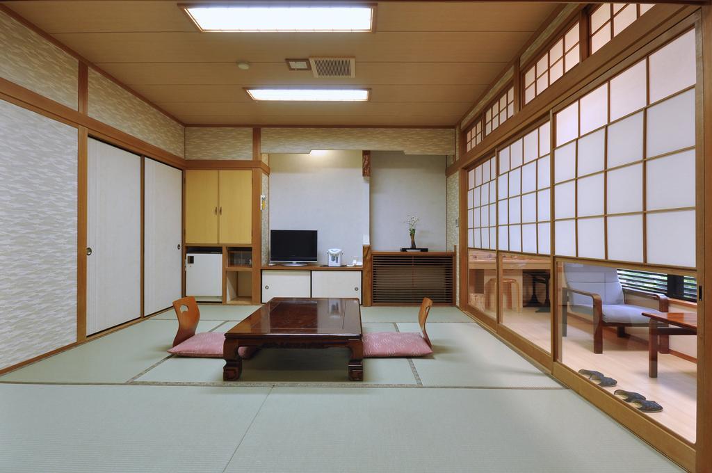 Отель Okumizuma Onsen Kaizuka Экстерьер фото
